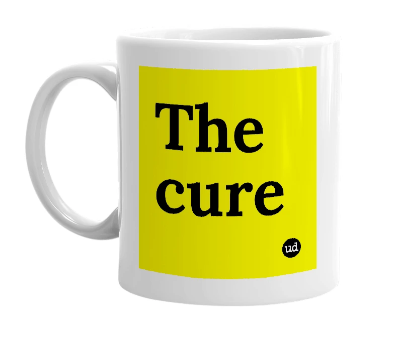 White mug with 'The cure' in bold black letters