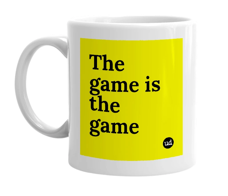 White mug with 'The game is the game' in bold black letters