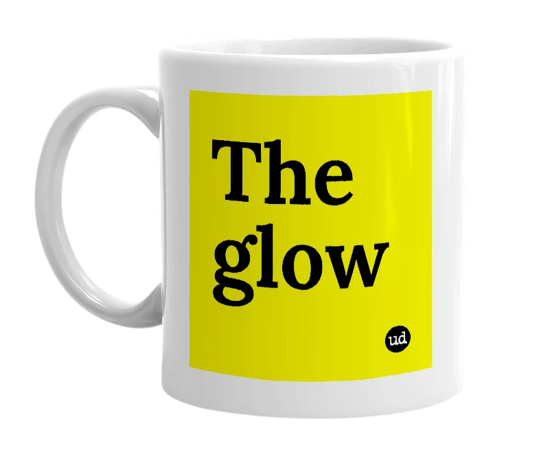 White mug with 'The glow' in bold black letters