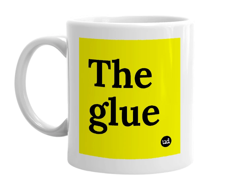 White mug with 'The glue' in bold black letters