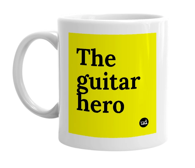 White mug with 'The guitar hero' in bold black letters