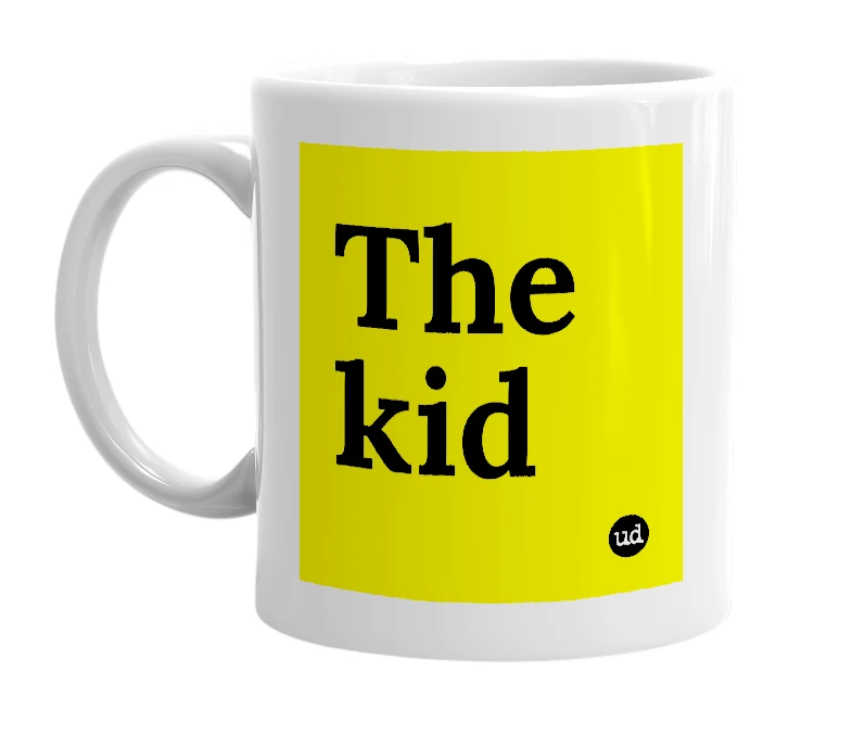 White mug with 'The kid' in bold black letters