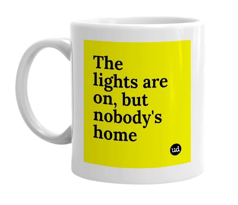 White mug with 'The lights are on, but nobody's home' in bold black letters