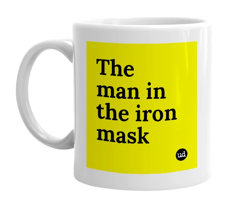 White mug with 'The man in the iron mask' in bold black letters