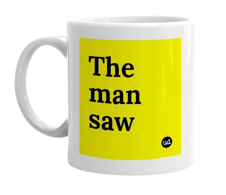 White mug with 'The man saw' in bold black letters