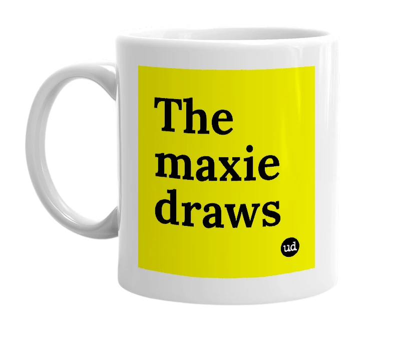 White mug with 'The maxie draws' in bold black letters