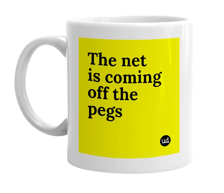 White mug with 'The net is coming off the pegs' in bold black letters