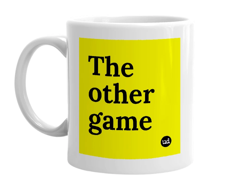 White mug with 'The other game' in bold black letters