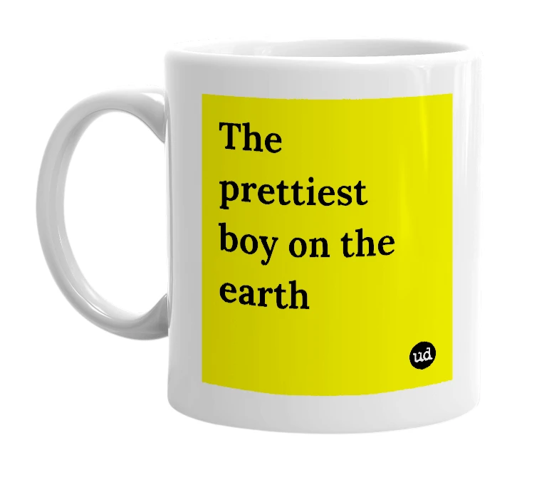 White mug with 'The prettiest boy on the earth' in bold black letters