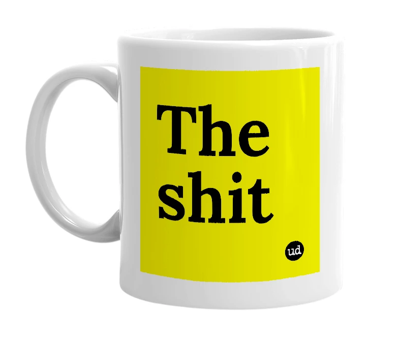 White mug with 'The shit' in bold black letters