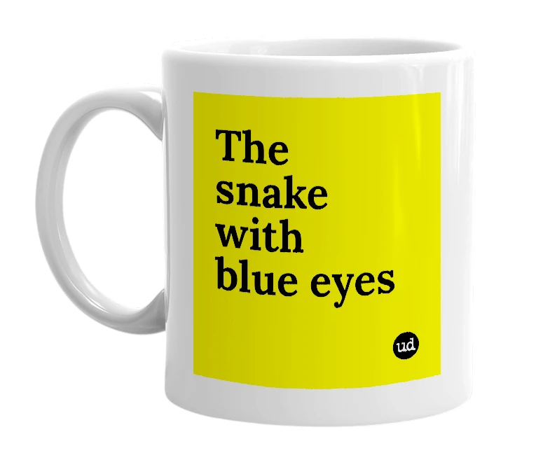 White mug with 'The snake with blue eyes' in bold black letters