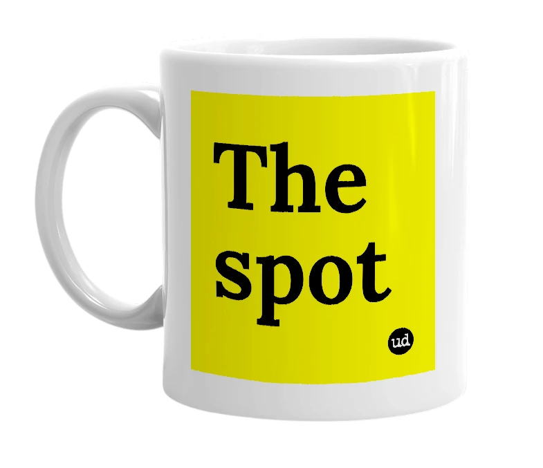 White mug with 'The spot' in bold black letters