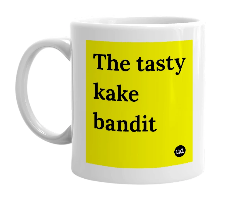 White mug with 'The tasty kake bandit' in bold black letters