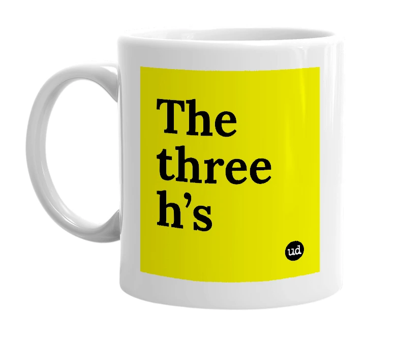 White mug with 'The three h’s' in bold black letters