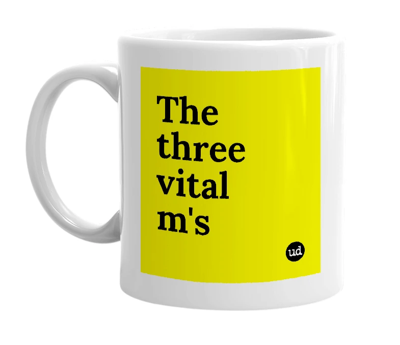 White mug with 'The three vital m's' in bold black letters