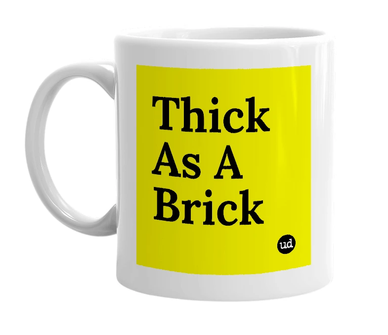 White mug with 'Thick As A Brick' in bold black letters