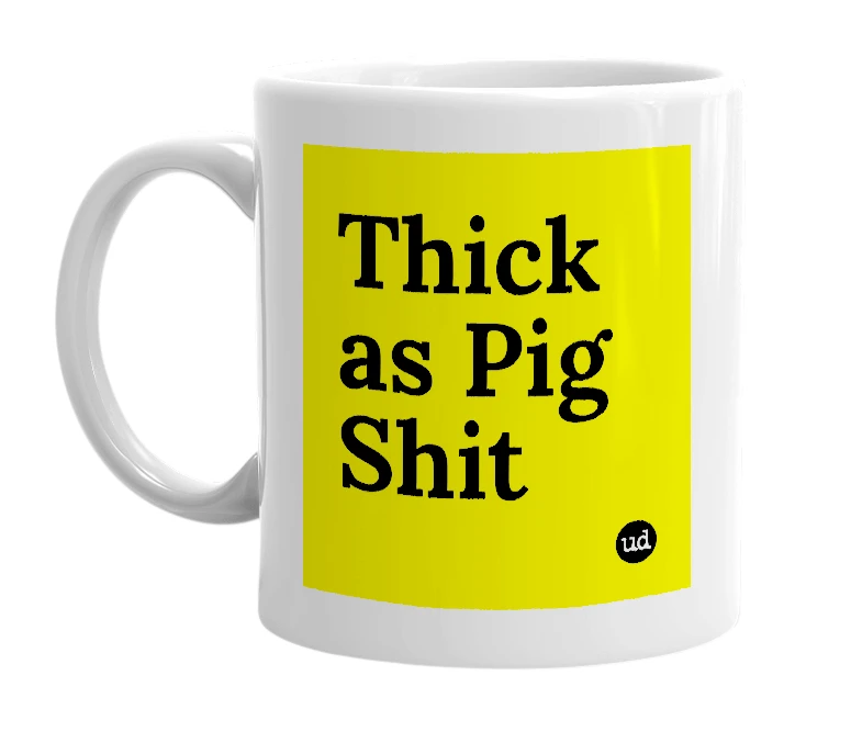 White mug with 'Thick as Pig Shit' in bold black letters