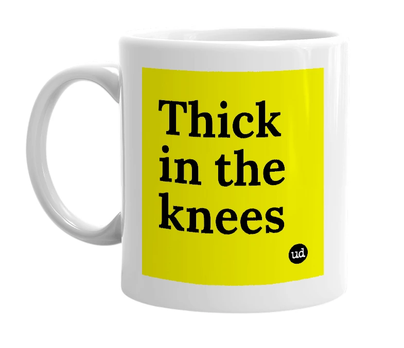 White mug with 'Thick in the knees' in bold black letters