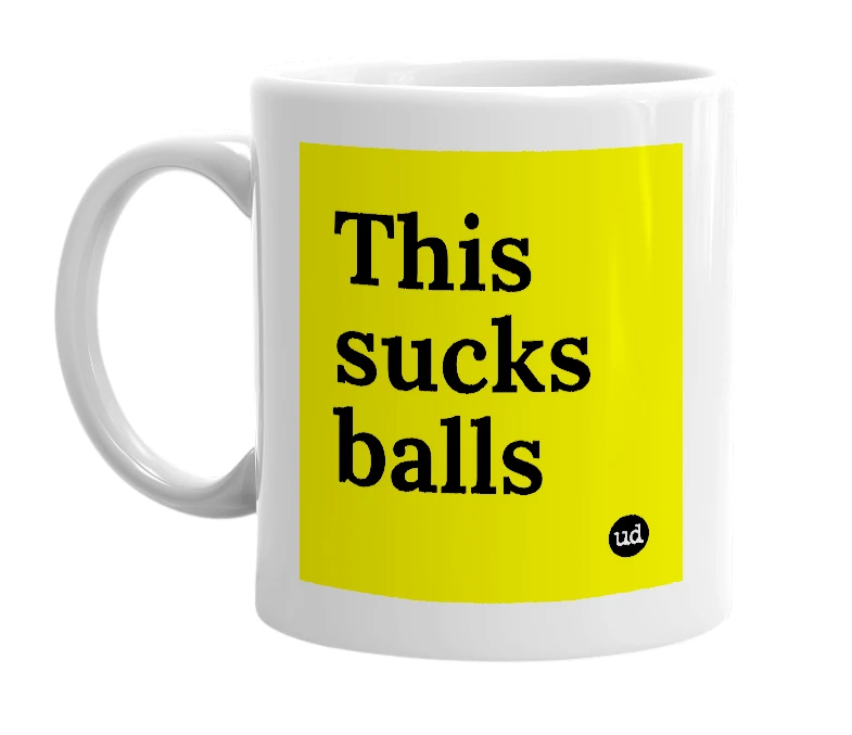 White mug with 'This sucks balls' in bold black letters