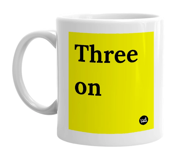 White mug with 'Three on' in bold black letters