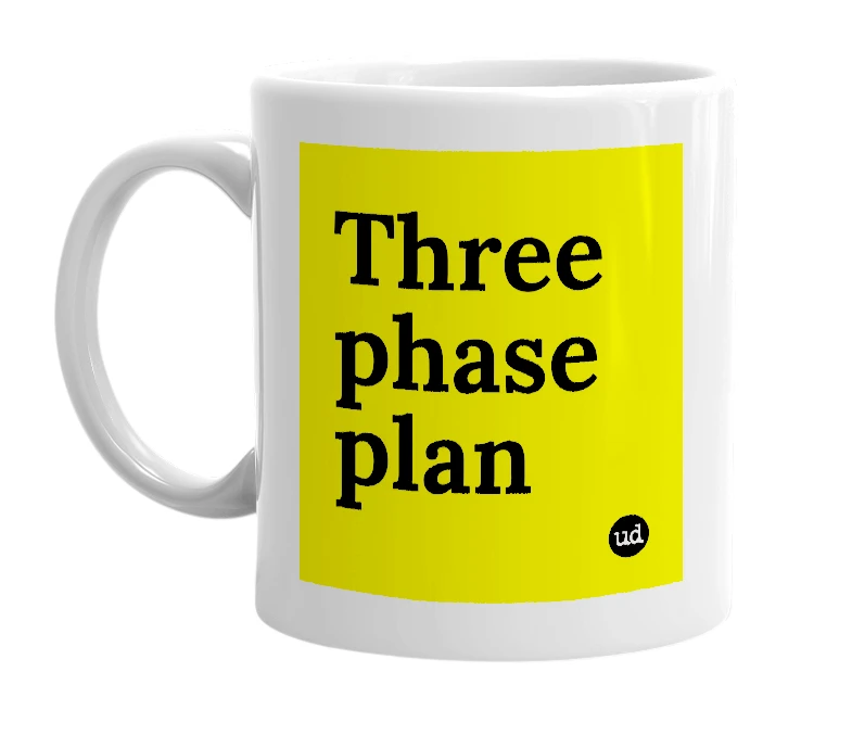 White mug with 'Three phase plan' in bold black letters