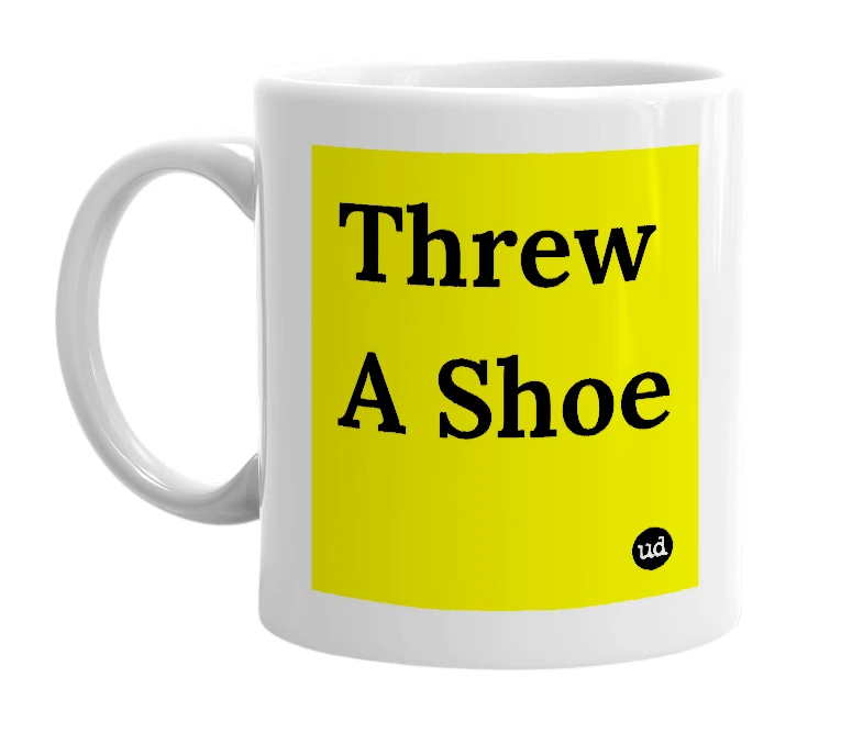 White mug with 'Threw A Shoe' in bold black letters