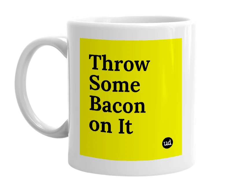 White mug with 'Throw Some Bacon on It' in bold black letters
