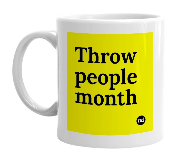 White mug with 'Throw people month' in bold black letters