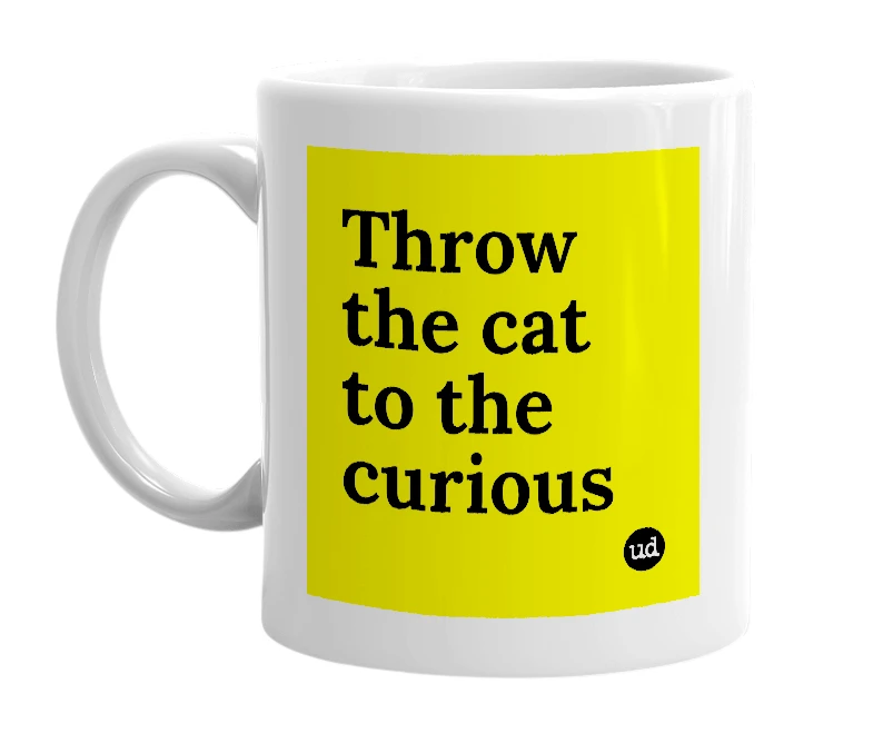 White mug with 'Throw the cat to the curious' in bold black letters
