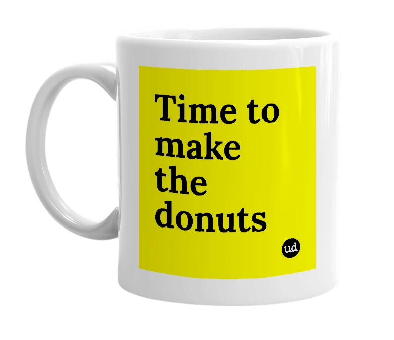 White mug with 'Time to make the donuts' in bold black letters