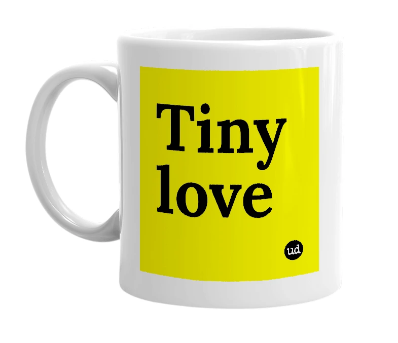 White mug with 'Tiny love' in bold black letters