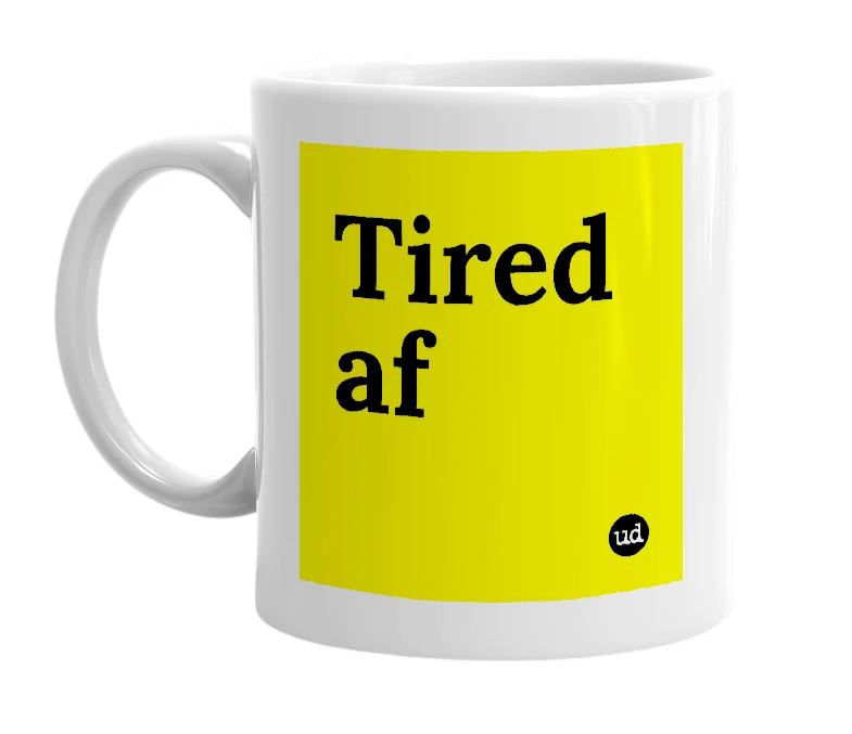 White mug with 'Tired af' in bold black letters