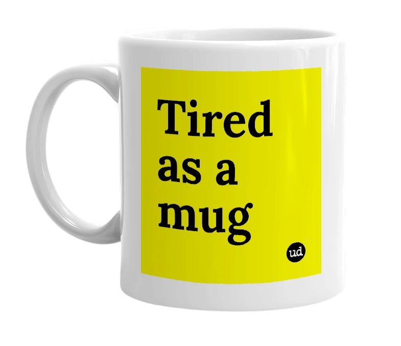 White mug with 'Tired as a mug' in bold black letters