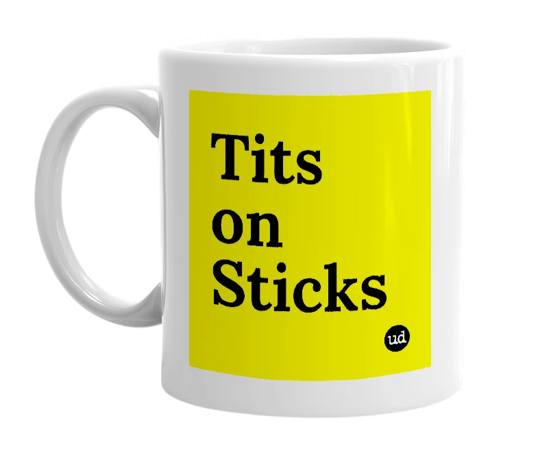 White mug with 'Tits on Sticks' in bold black letters