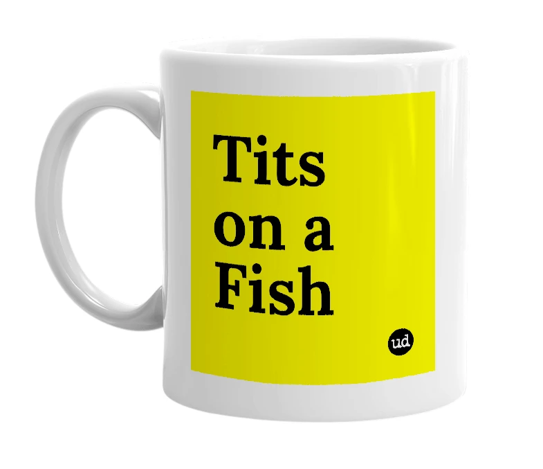White mug with 'Tits on a Fish' in bold black letters