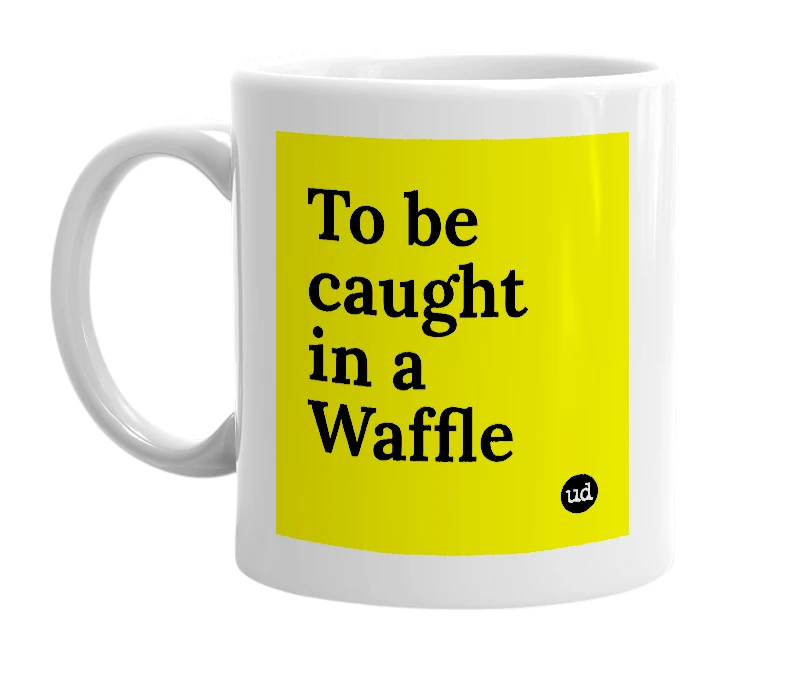White mug with 'To be caught in a Waffle' in bold black letters