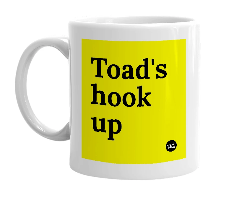 White mug with 'Toad's hook up' in bold black letters
