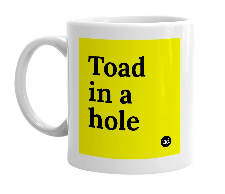 White mug with 'Toad in a hole' in bold black letters