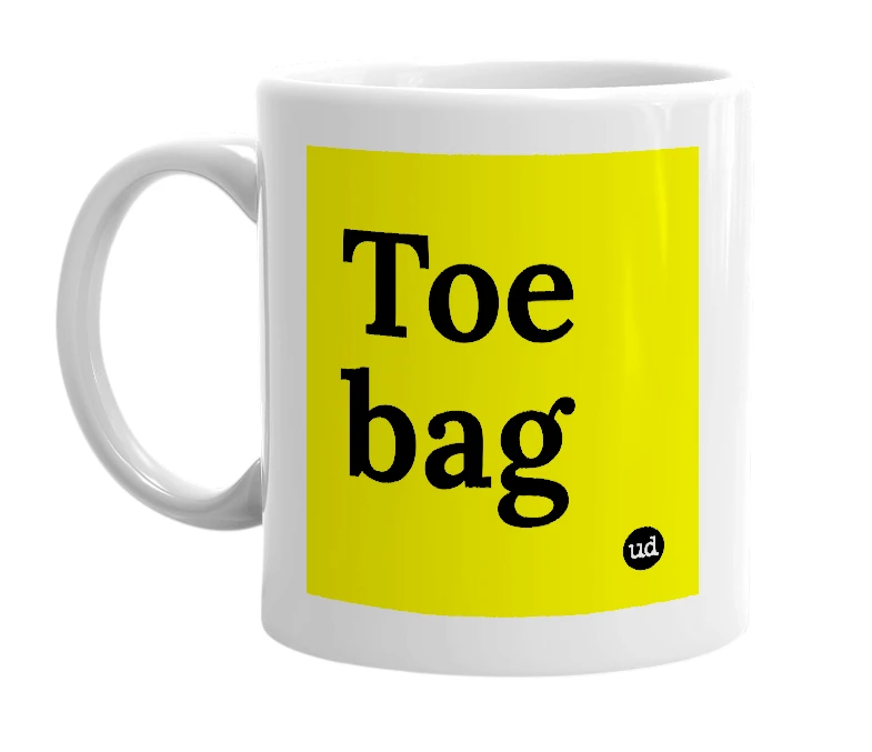 White mug with 'Toe bag' in bold black letters