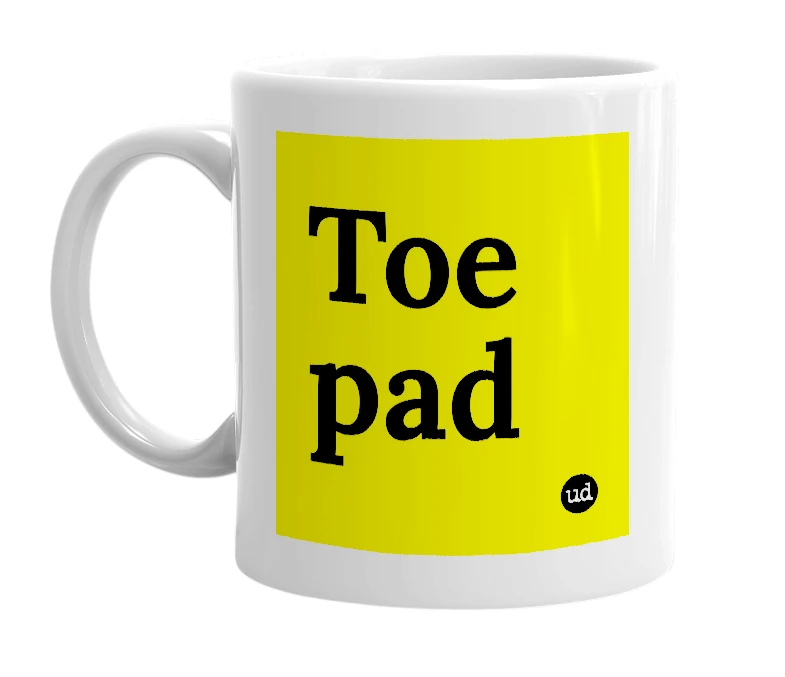White mug with 'Toe pad' in bold black letters