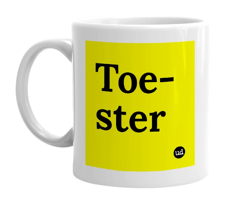 White mug with 'Toe-ster' in bold black letters