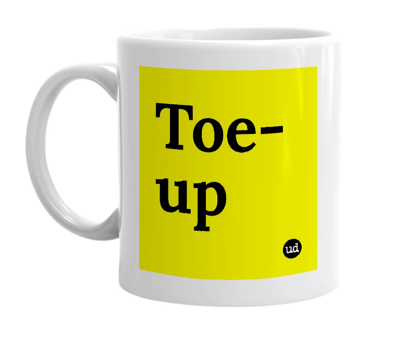 White mug with 'Toe-up' in bold black letters