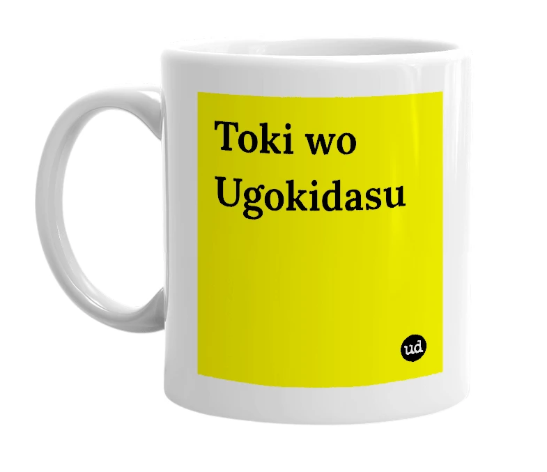 White mug with 'Toki wo Ugokidasu' in bold black letters
