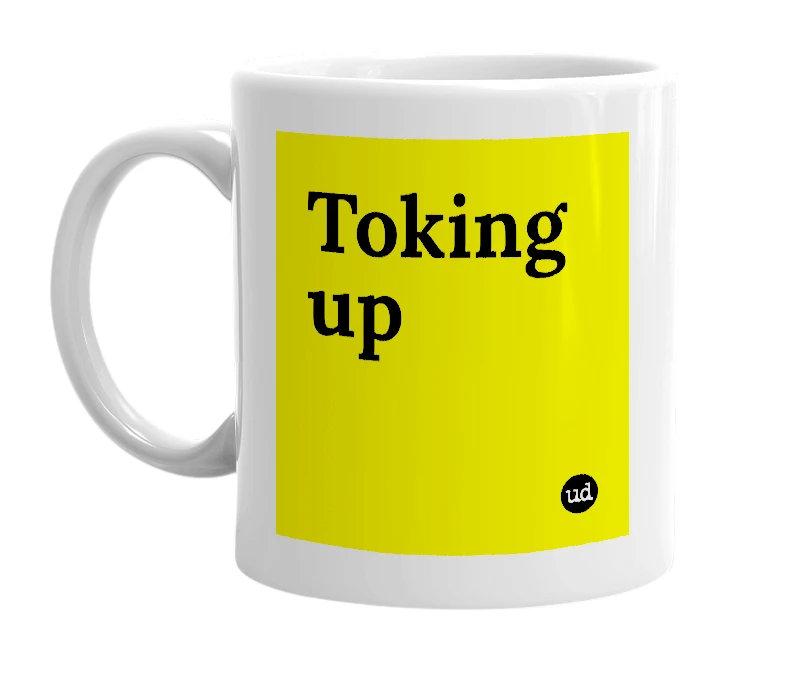 White mug with 'Toking up' in bold black letters