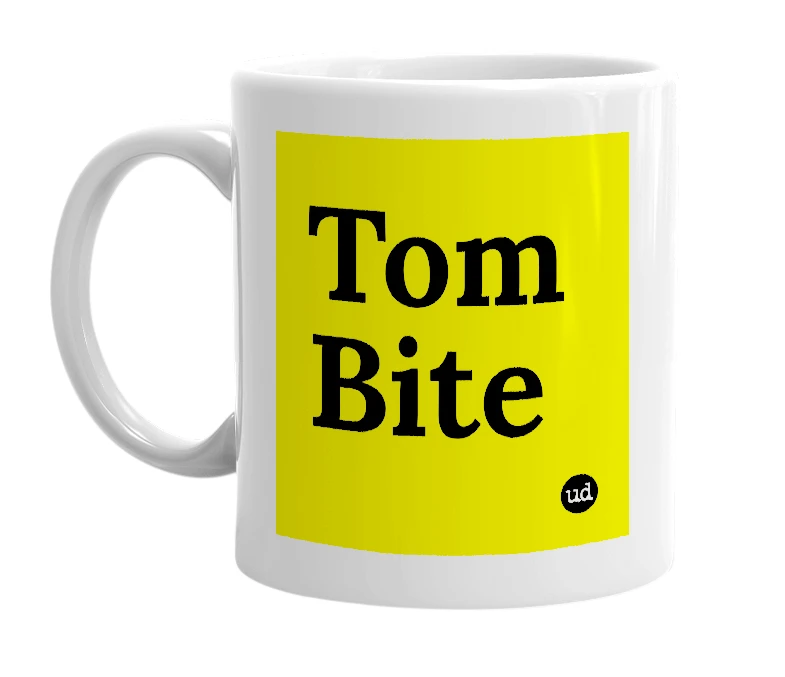 White mug with 'Tom Bite' in bold black letters