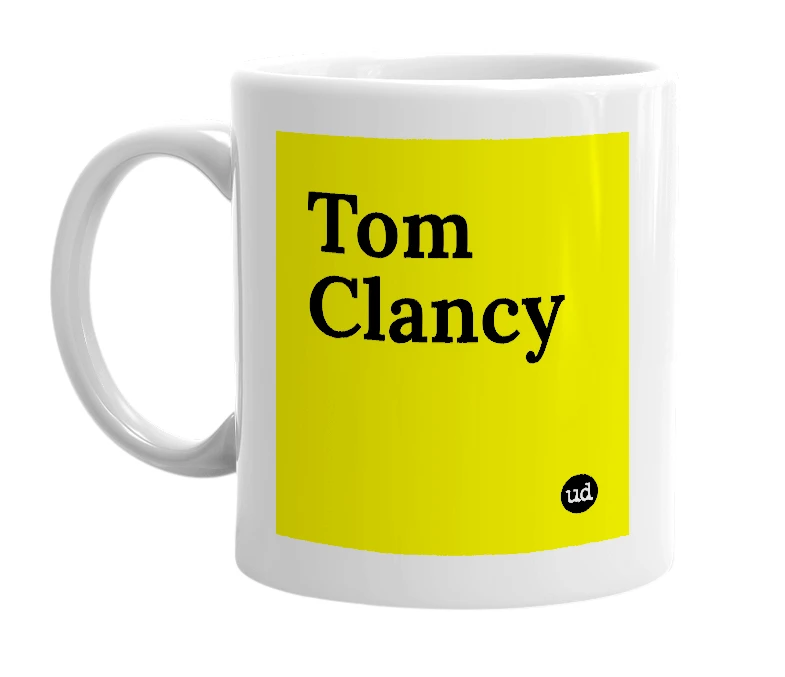 White mug with 'Tom Clancy' in bold black letters