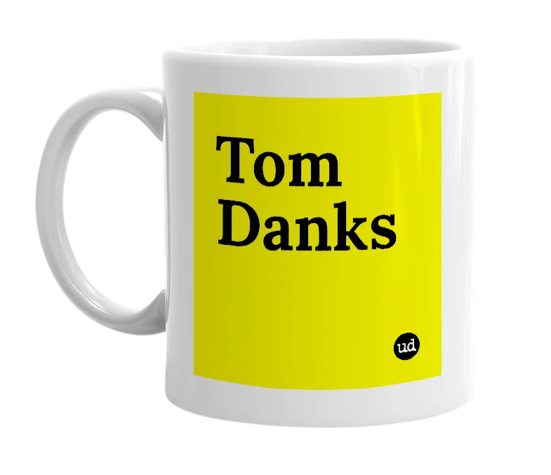 White mug with 'Tom Danks' in bold black letters