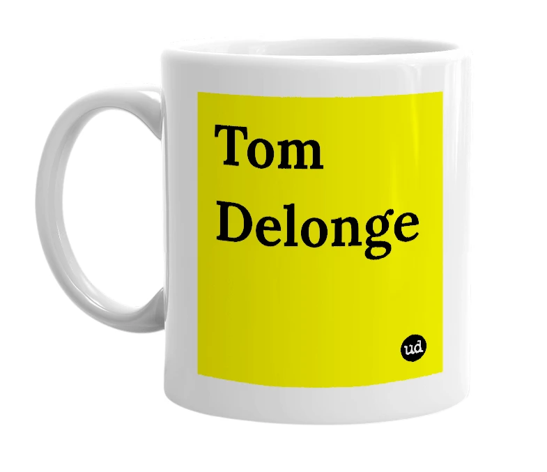 White mug with 'Tom Delonge' in bold black letters
