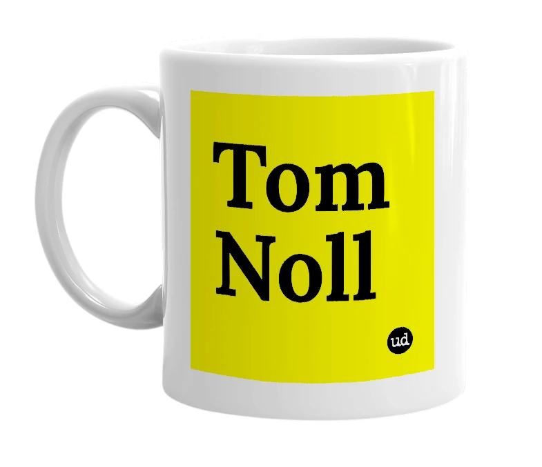 White mug with 'Tom Noll' in bold black letters
