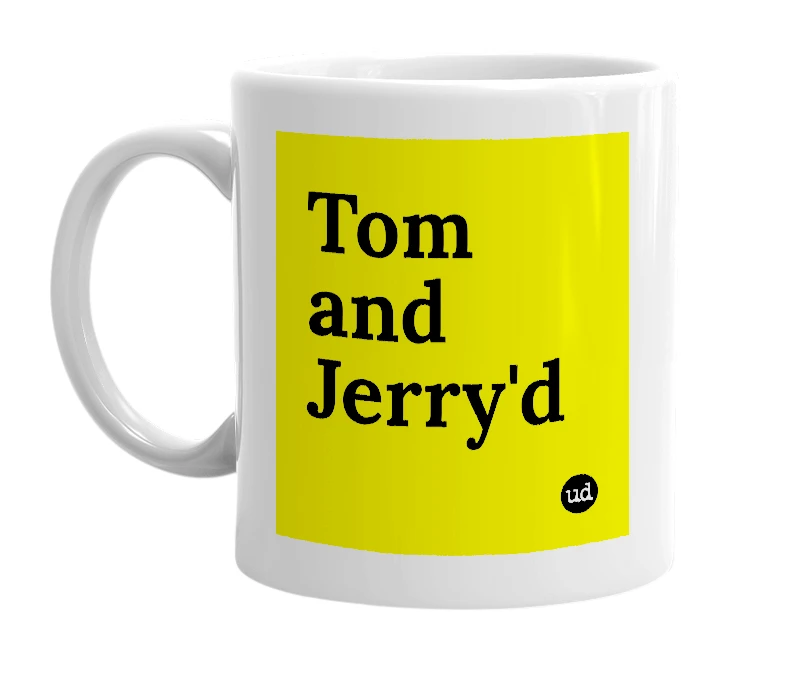 White mug with 'Tom and Jerry'd' in bold black letters